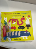 Libro magico con pennello ad acqua
