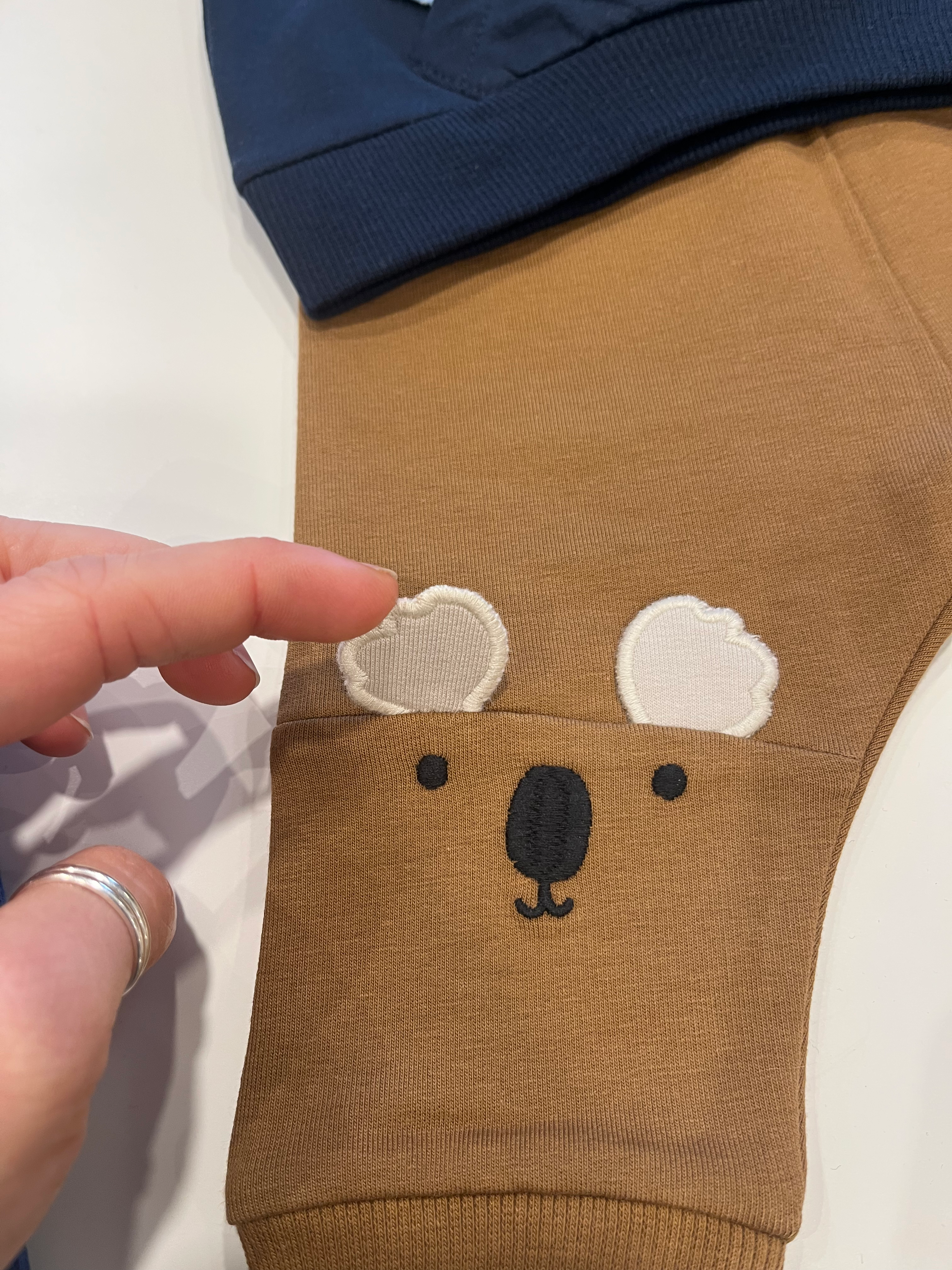 Tuta koala blu