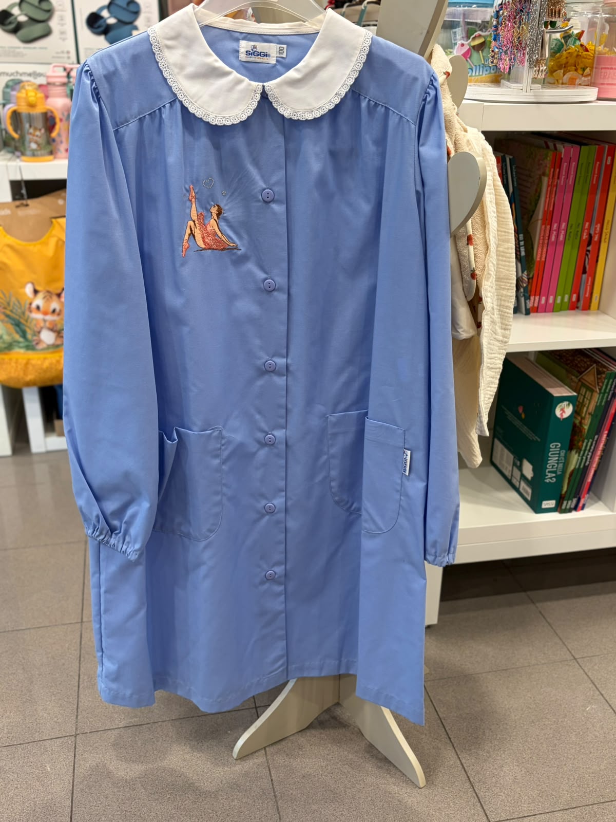 grembiule azzurro bottoni ballerina